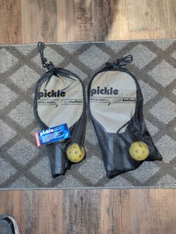 Pickle ball paddles. 2 sets.