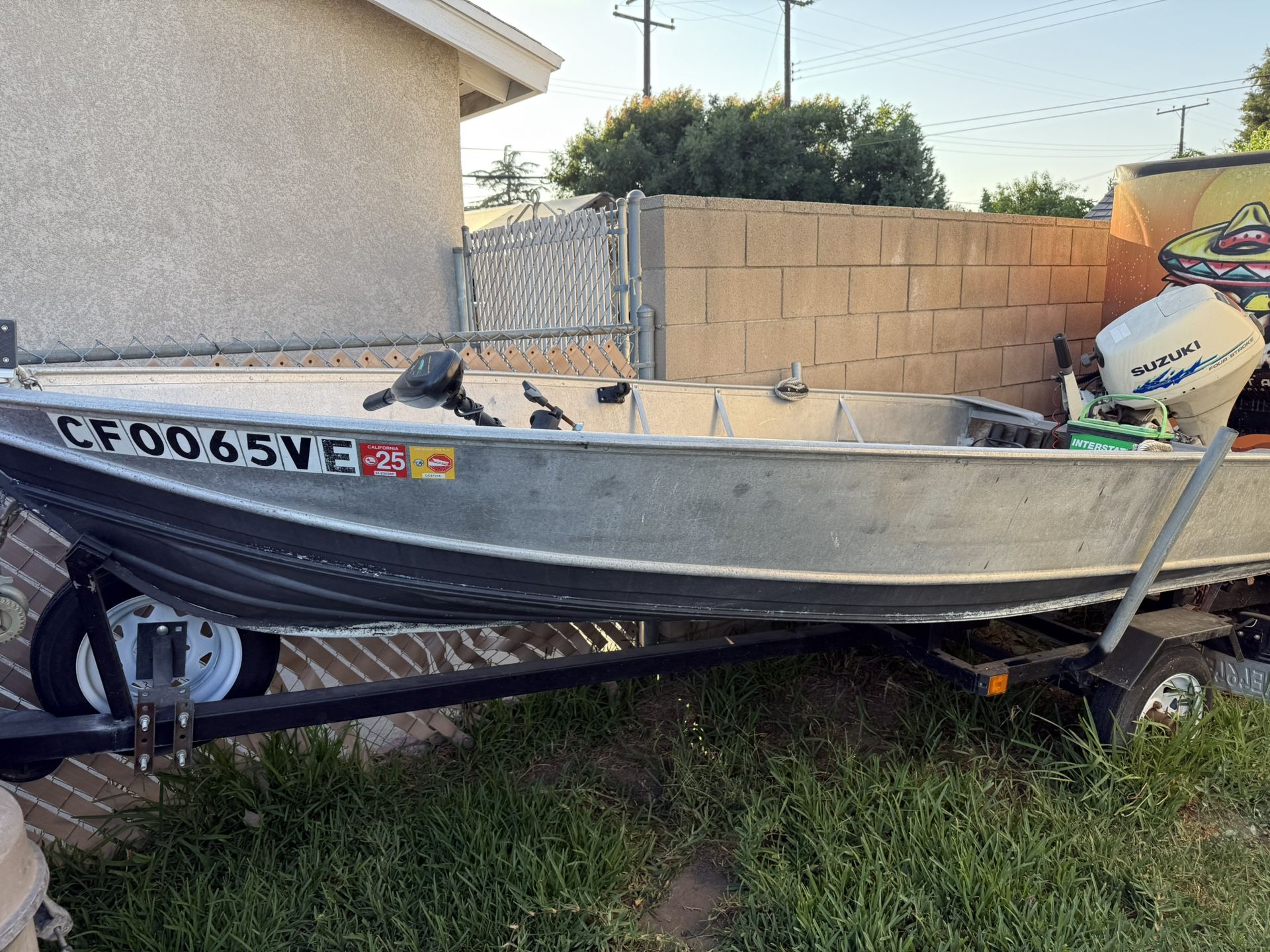 Trailer With A Fishing Boat And Motor 
