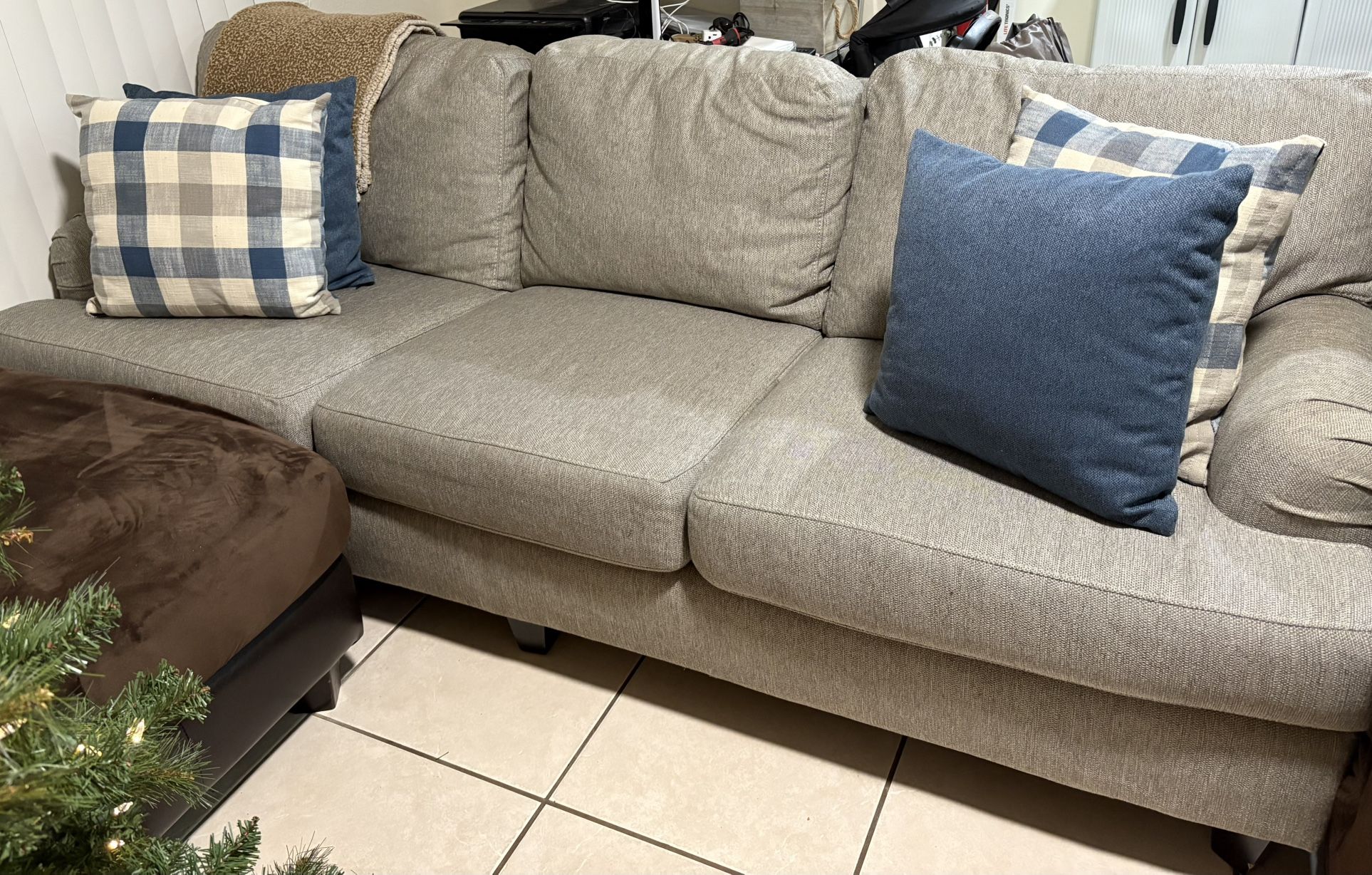 Grey Couch With 4 Decorative Pillows