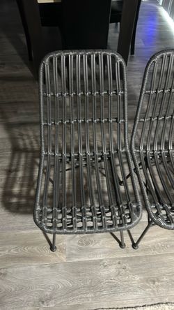Set of 4 chairs. Steel construction with plastic weave