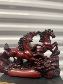 Red running horse figurine