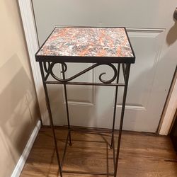 Wrought iron and tile pedestal plant stand
