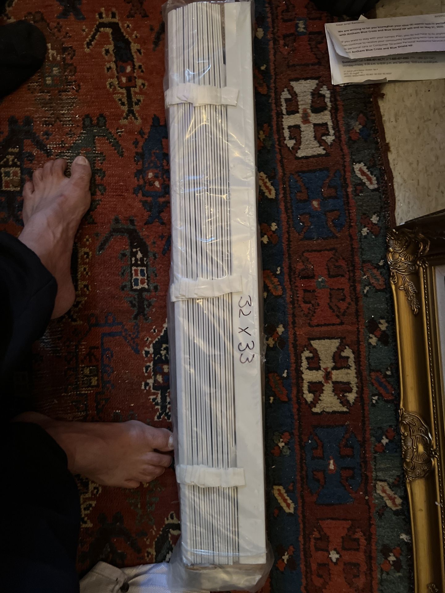 NIB: pair of white faux wood blinds. 31.5”x33”