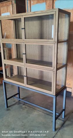 Curio cabinet with iron Base