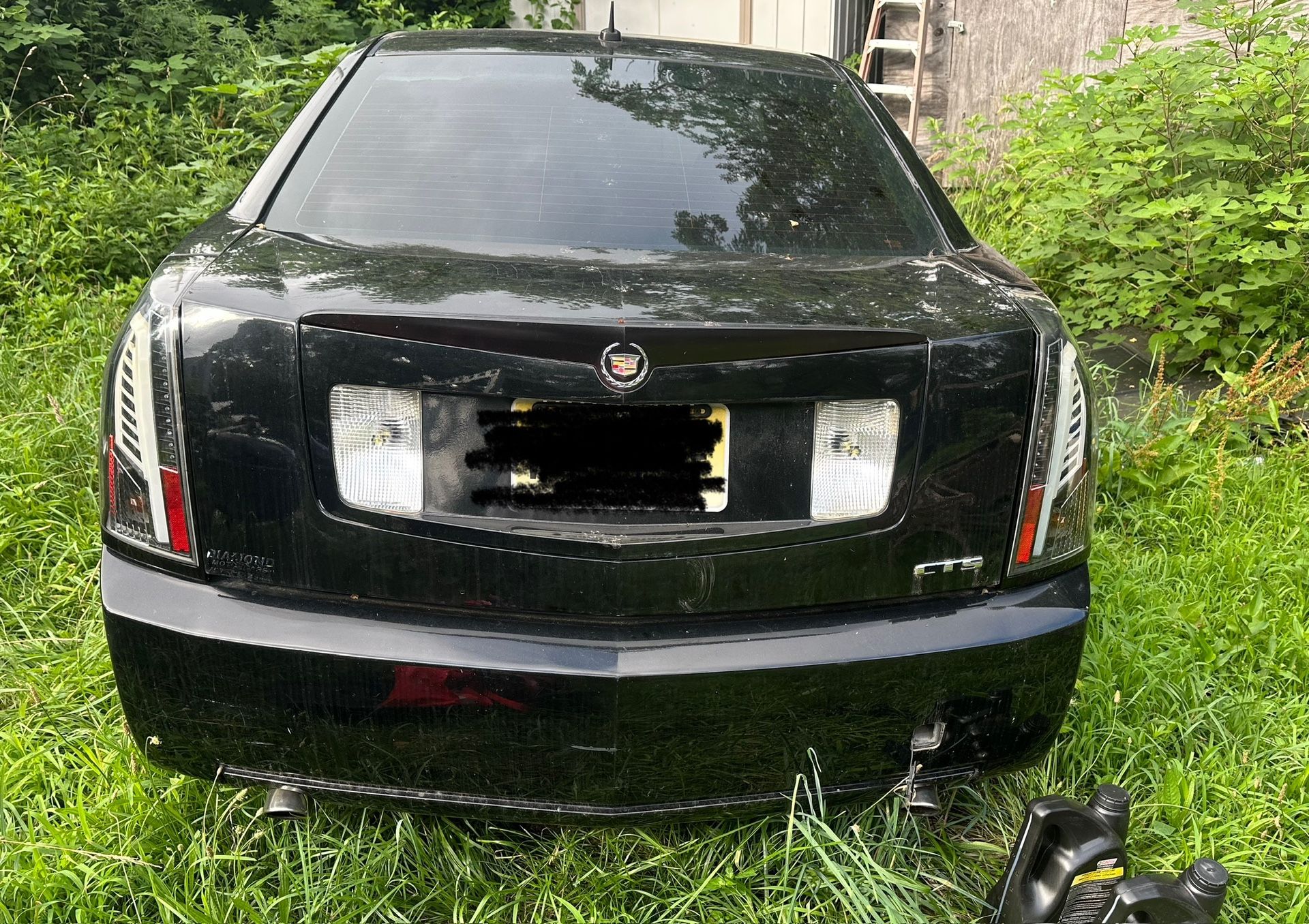 06 CTS AFTERMARKET TAIL LIGHTS