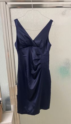 Sexy navy blue formal dress, double lined, zip up back. Worn to a wedding. Roused at the waist, size 11, very comfortable dress.