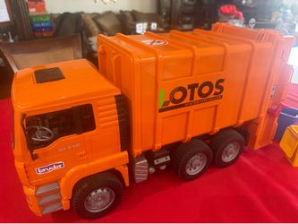 Bruder Man TGA 41.440 LOTOS Orange Recycling/Garbage Truck - in Miami Dolphin Mall area.