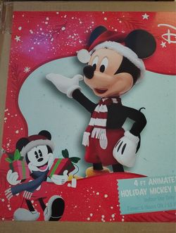 Animated 4-foot tall Disney Mickey Mouse holiday figure is motion-activated.