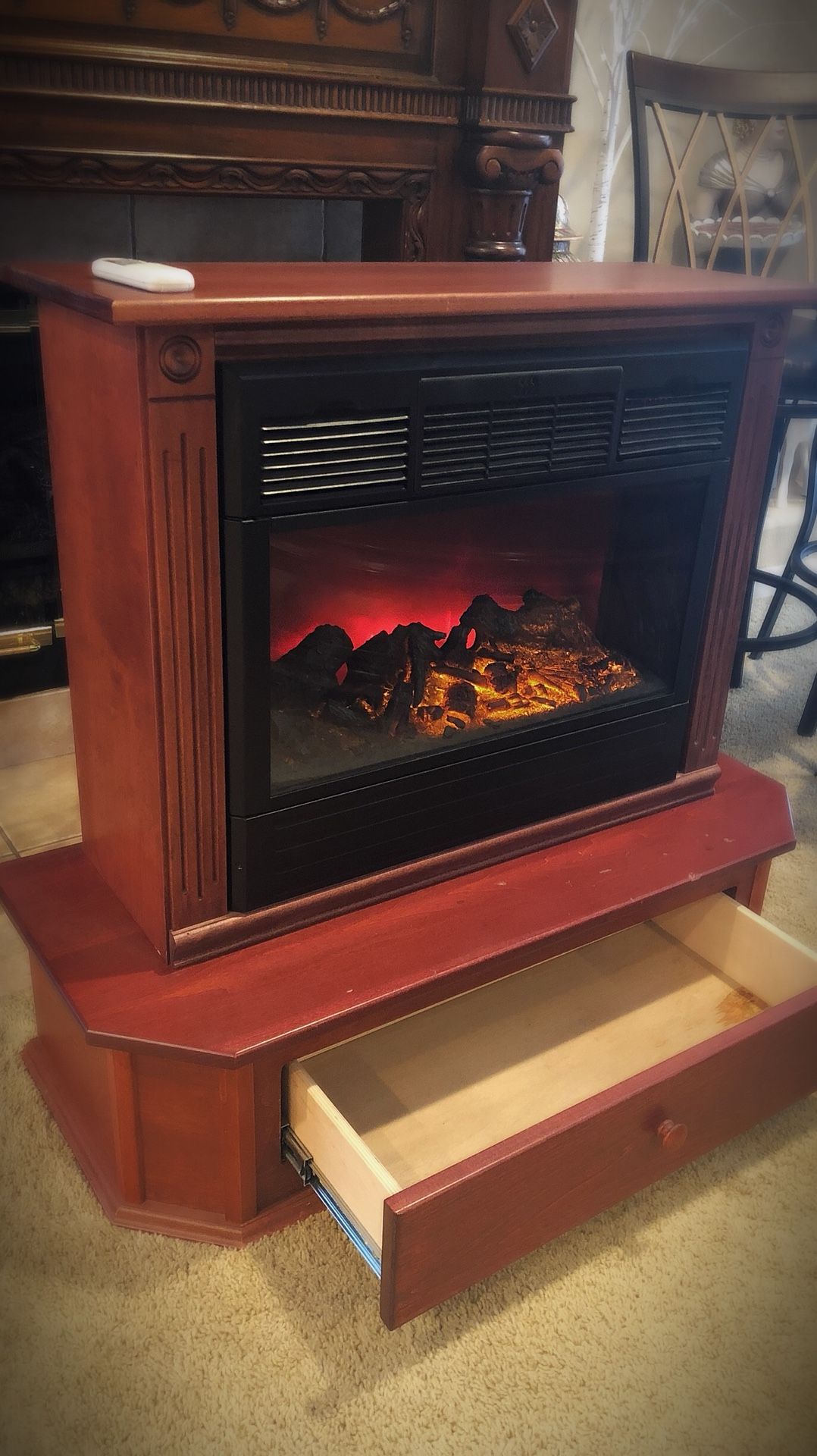 Amish electric fireplace and heater with remote Its american made fireplace Has thermostat for the heat Comes with remote