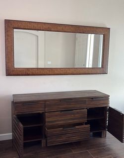Rectangular landscape mirror with decorative frame and original leather texture