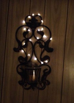 Wrought iron candle holder