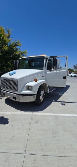Selling a reliable 2001 Freightliner FL60 Single Axle Dump Truck in excellent mechanical condition. This truck is the perfect size for landscaping, ma