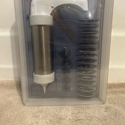 Stainless Steel Cookie Press By: Kuhn Rikon “New” Includes: 14 Metal Cookie Disk, 6 Decorating Icing Tips, Recipes,& Manual In Nice Case For Storage.