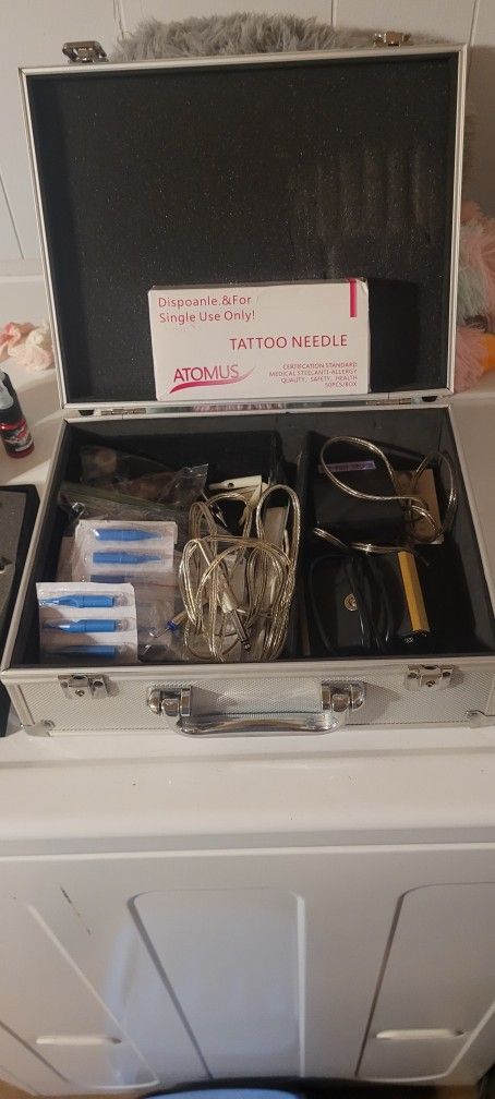 Tattoo Gun With New Ink And Needles