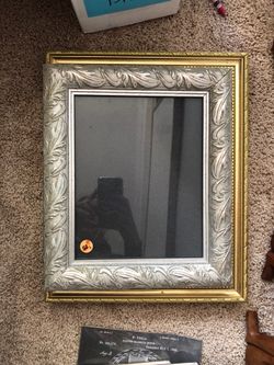 Two vintage picture frames with glass