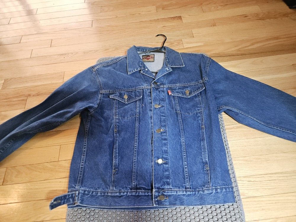 Large gently used VIP Jean Jacket 