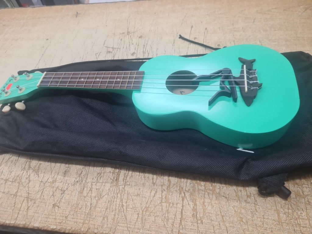 Makala Surf Green Soprano Shark Ukulele - MK-SS/GRN Bundle with a Tuner and Polishing Cloth