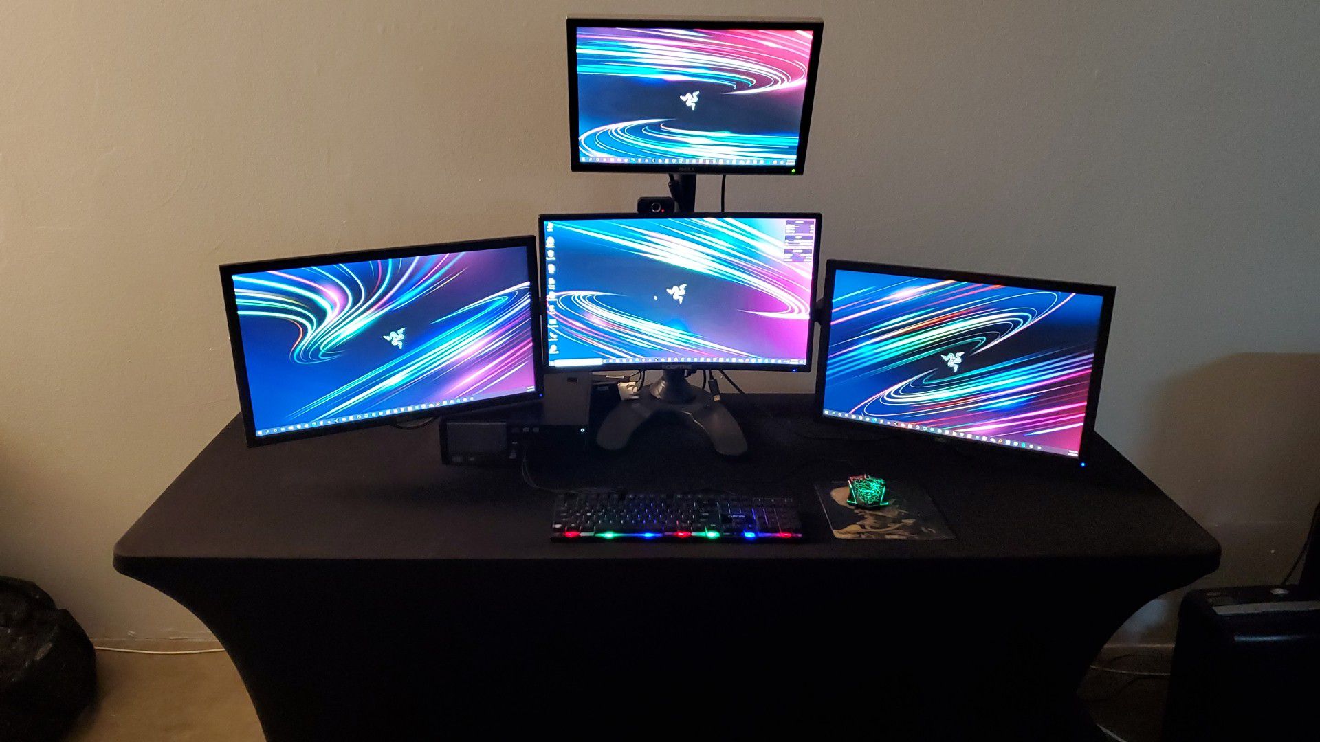 Quad screen desktop computer with table and gaming chair