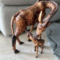 One solid piece of Hand carved wood Giraffe and baby 