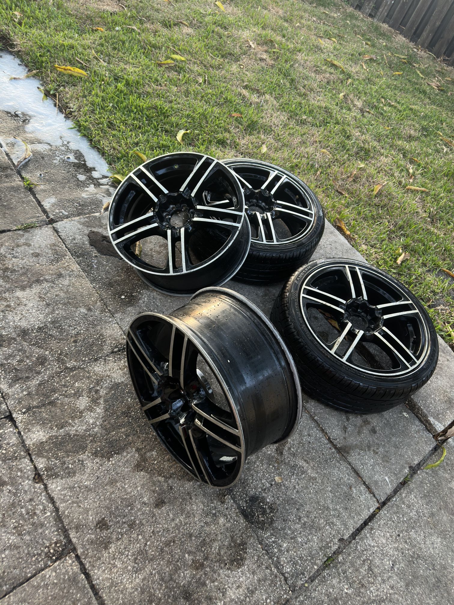 4 rims for sale 2 with tires on them