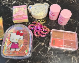 Fun New Unused Beauty Products and a Hello Kitty Mini Keychain Bag.    See Description