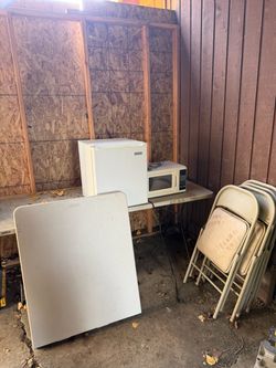 Foldable  tables, metal chairs and small appliances