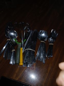Lots of forks spoon knifes