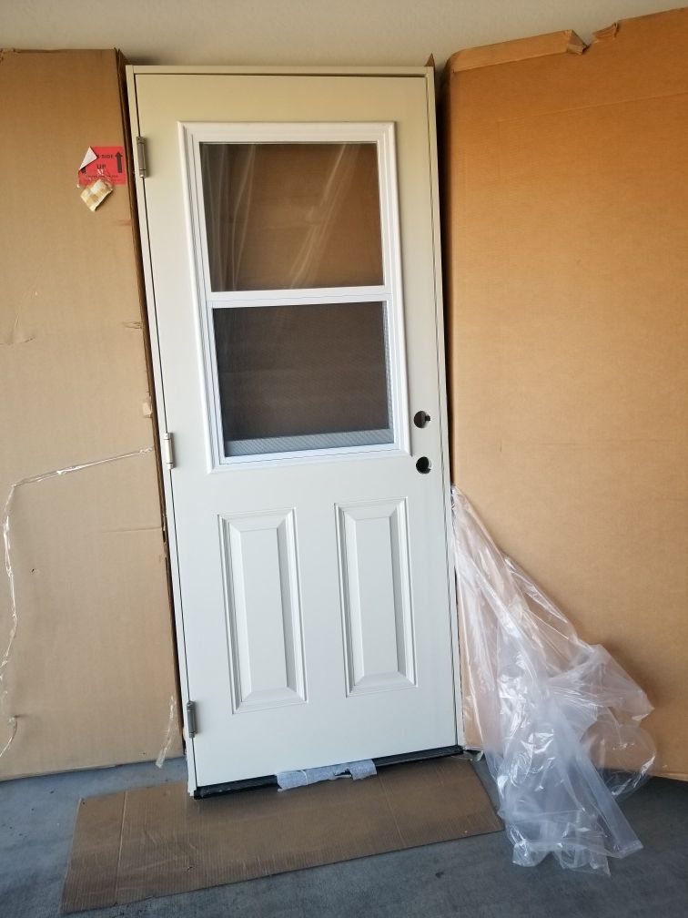 Brand new Prehung Trailer/ mobile home entry doors brand new still in the box comes with brick