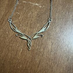 Elegant Gold and Silver Leaf Necklace