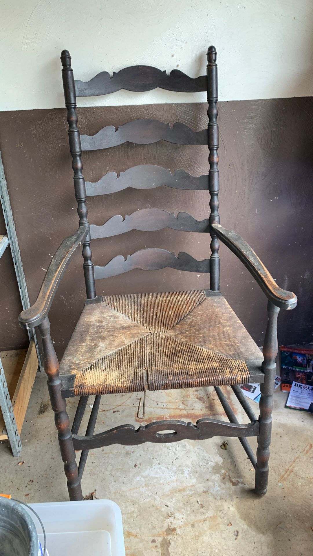 Old ladder back arm chair