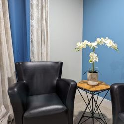 2x Faux Leather Chairs With Swivel ($50)