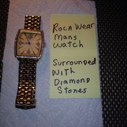 Roca Wear Man's Watch. Not Working. Could Need Battery. Diamond Like Stones.. Awesome Condition No Scratches On The Front. All Sales Final