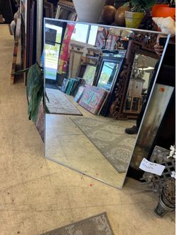 rectangular mirror features a slim silver aluminum frame - 24” x 36”