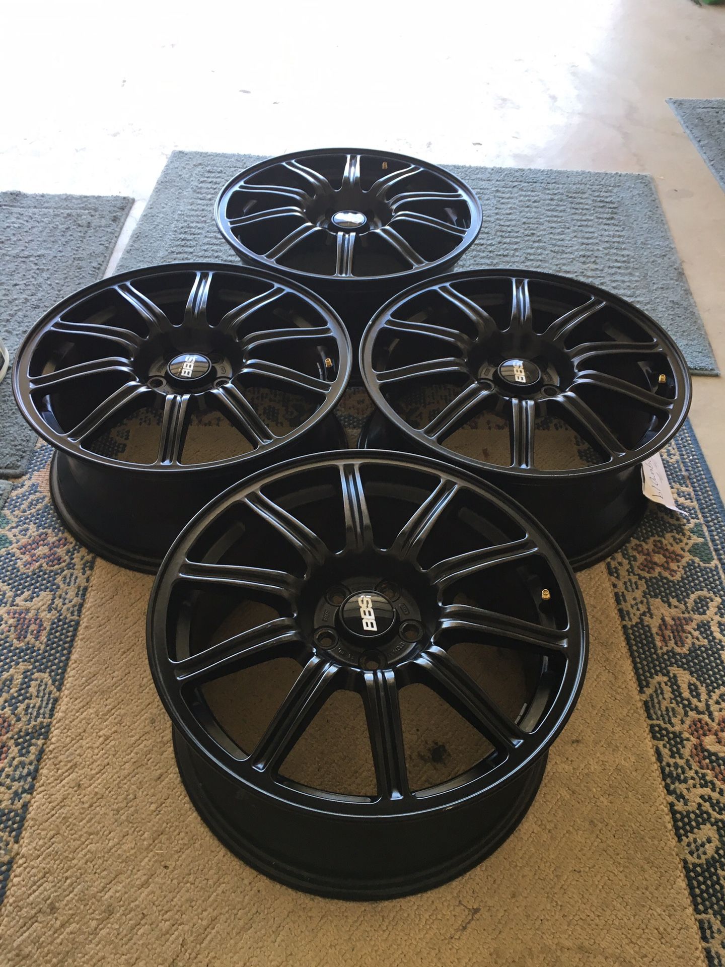 17 inch 5 x 100 Subaru WRX STI black powder coated BBS wheels