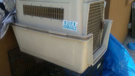 2 jaulas para perro una mediana y otra grande
