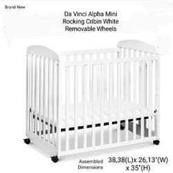 Brand New Da Vinci Alpha Mini Rocking Crib In White Removable Wheels 