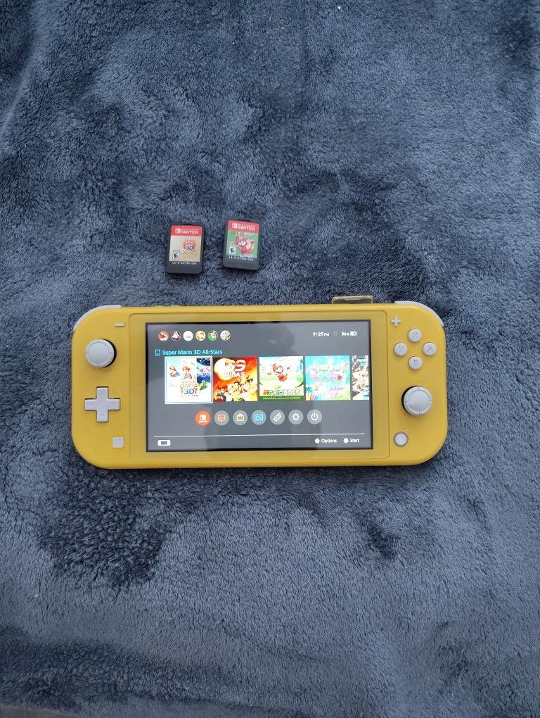 Nintendo Switch Lite With 2 Games