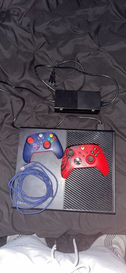 Xbox one comes with two controllers & a charger it works good