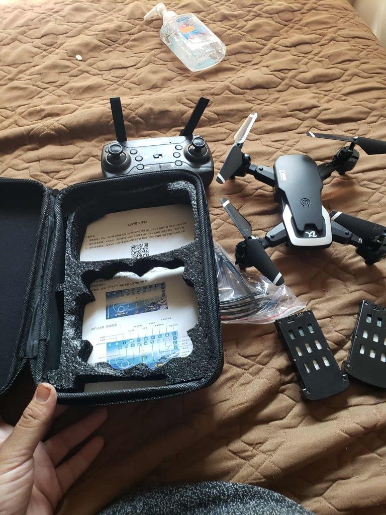 2 Battery's 1 Controller. 1 Drone Silver & Black. All Brand New Never Fly. Has 4K Camera come with Case. $120! Free delivered in person