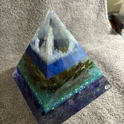 POWER OF THE PYRAMID - SIZE: 6x6x6 Unleash the enigmatic power of the pyramid in your home. Handcrafted for enduring beauty, this decorative pyramid a