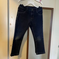 These Nautica boys' jeans are in fantastic pre-owned condition. Featuring a deep indigo wash, they offer a clean and polished look suitable for both s
