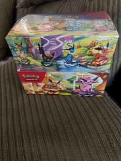 Prismatic Evolutions Mini Tin Display