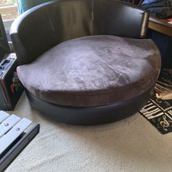 Brown swivel chair for two