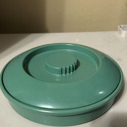 Green tortilla plastic container with lid.  Read description