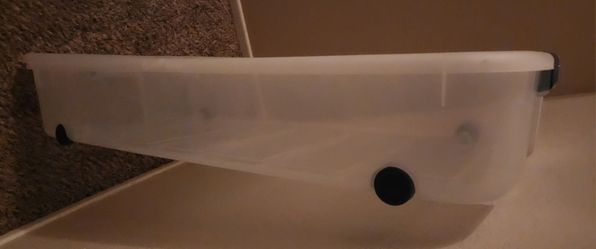 2 Rolling, under bed, large plastic storage.