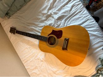 First Act Acoustic Guitar