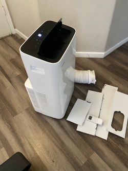 Toshiba 8,000 (DOE) BTU Portable AC Cools 350 sq. ft. with Dehumidifier and Remote Control in White
