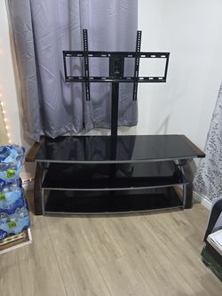TV stand holds up to a 75"