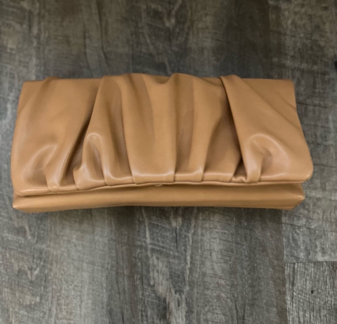Express camel clutch Purse . New with Out tag,