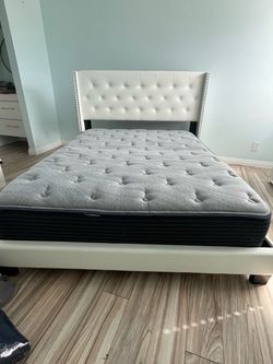 Bed with mattress